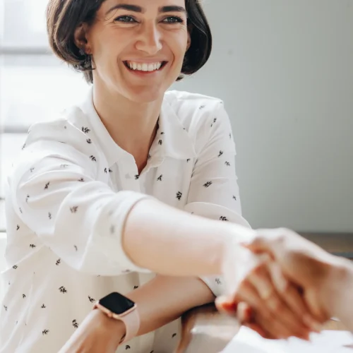 happy-businesswomen-doing-a-handshake-2026-01-07-23-32-15-utc